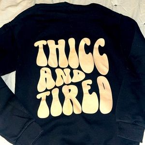 Black hoodie with peach “thicc and tired”